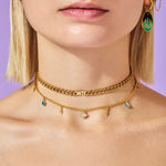 Female wearing the WTF and Storm necklace